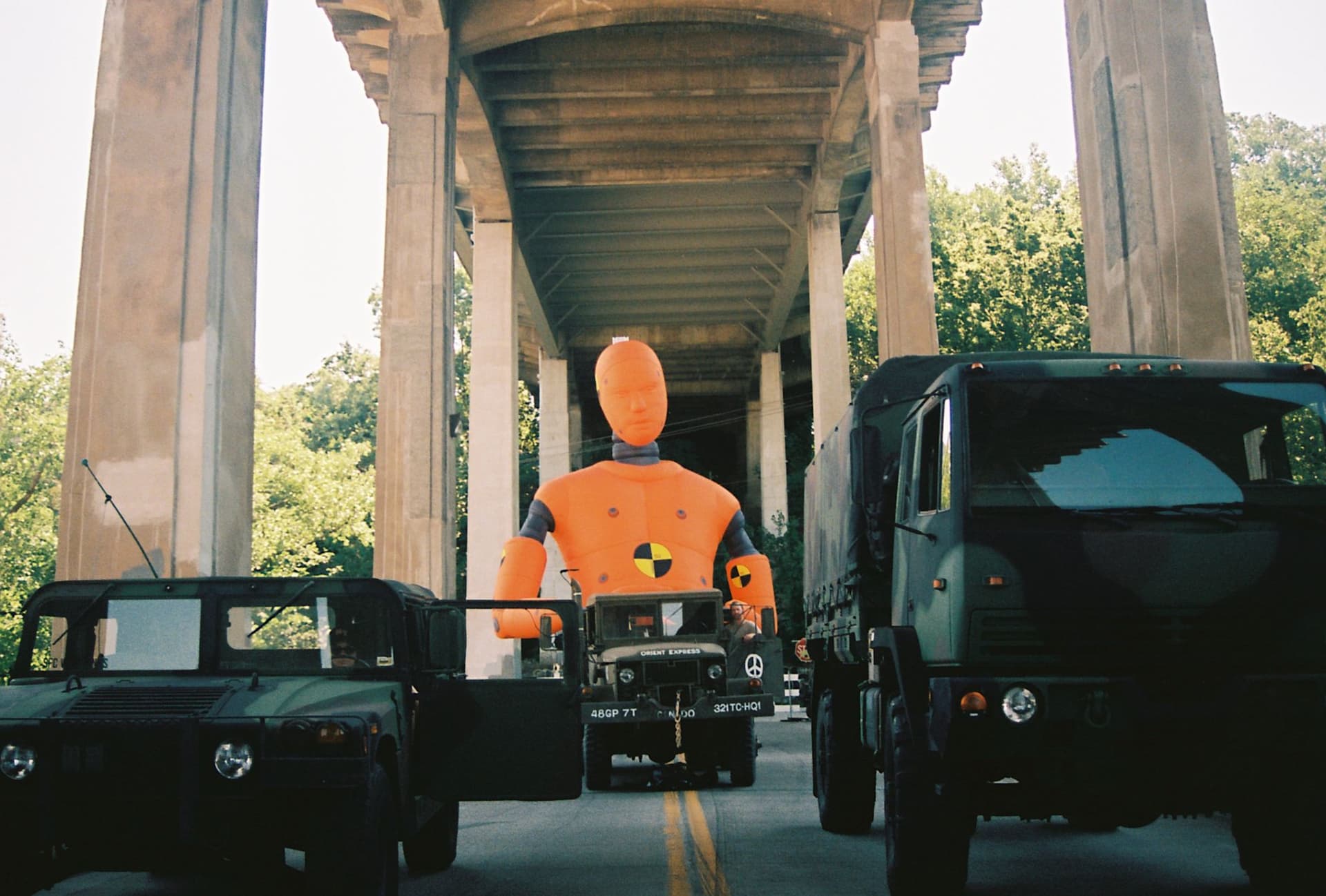 Group of military cars on bridge